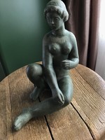 Old terracotta female statue