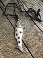 Old cartier style bone fish pendant on a leather necklace