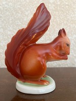 Marked porcelain chipmunk raven house figural sculpture