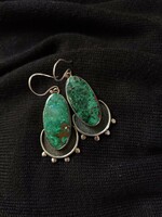 Huge silver earrings with a fabulous green stone