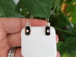 A pair of art deco gold earrings with onyx and brill inlays