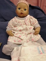 Zapf doll with ample wardrobe