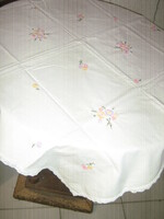 Beautiful hand-embroidered antique lace-edged vintage colorful floral needlework tablecloth
