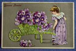 Antique embossed New Year greeting card - little girl 4-leaf clover wheelbarrow pansy from 1907