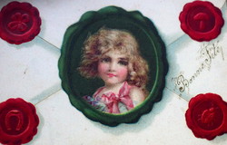Antique embossed envelope postcard - portrait of a little girl. Seals - clover, mushroom, ladybug, horseshoe