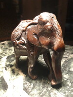 A block of stone carved elephant - statue