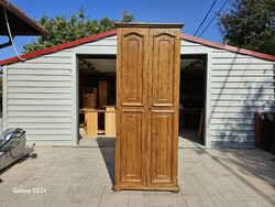 Oak double-door wardrobe in good condition for sale.