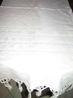 Beautiful snow-white fabric patterned fringed edge woven tablecloth running