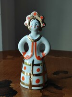 Charming folk dancing porcelain doll in Russian folk costume