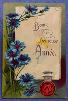 Antik dombornyomott Újévi üdvözlő képeslap - pergamen pecséttel szerencsepatkó szalmavirág