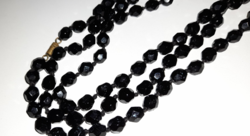Old extra long black necklace