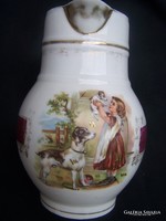 Pitcher - depicting a little girl with dogs. With colorful figural painting and gilding