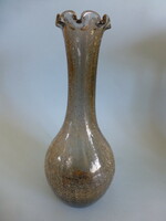 A rare carved veil glass vase with a frilled mouth