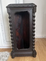Antique carved favor holder for a corner.