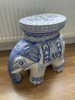 A beautiful large porcelain elephant, flower stand, seat, small table, who would like it for what?