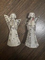 Two silver laced angel Christmas tree decorations are damaged