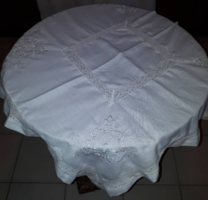 Beautiful white lacy flower embroidered tablecloth