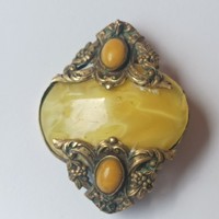 Gilded amber stone brooch.
