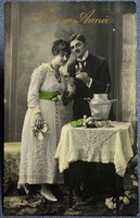 Antique New Year greeting photo postcard - elegant couple from 1921