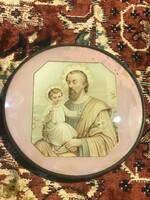 So-called Saint image painted on glass, stickered
