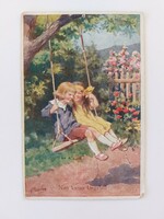 Old postcard 1932 postcard children swinging