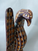 Carved wooden turul bird statue
