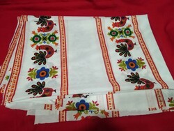 Old curtain or tablecloth with peacock rooster