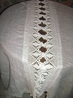 A pair of beautiful special hand-crocheted vintage-style stained glass curtains with a lace edge
