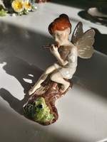 Sweet forest fairy, angel, pixie, playing flute for a frog, detailed figure