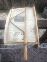 Rattan cafe newspaper holder with the 1981 People's Freedom.