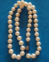 Real cultured pearl necklace with knotted cord and magnetic clasp