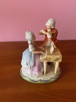 Figurative sculpture of a baroque musical couple by Capodimonte