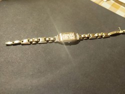 Women's Swiss gold watch with gold strap