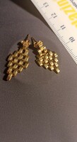Gold earrings in art deco style,