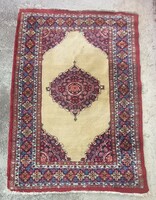Hand-knotted Iranian Tabriz carpet is negotiable