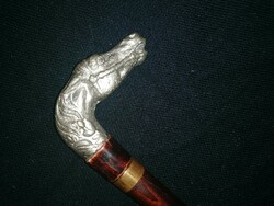 A stick with a dagger, with a horse's head