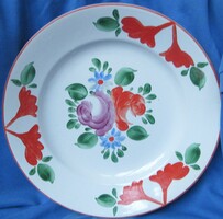 Handmade ceramic wall plate with floral pattern, marked, diameter 22.8 cm