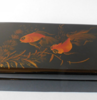 Old oriental lacquer box with goldfish