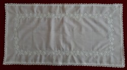 White embroidered tablecloth, centerpiece