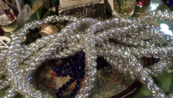 About 5 m long, twisted, shiny boa for Christmas tree, in good condition.