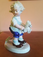 Little boy riding a horse (flawless) old porcelain statue