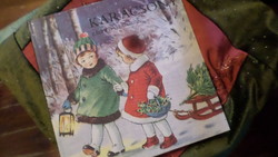 Karácsony régi képeslapokon című könyv sok képpel , jó állapotban .