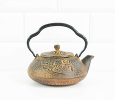 Japanese cast iron teapot for tea ceremony - with cherry blossom pattern