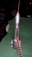 Now an antique sheet metal factory metal sheet moon rocket toy as shown in the pictures