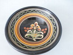 Antique glazed folk ceramic wall plate