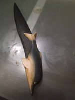 Wooden dolphin leaf opening