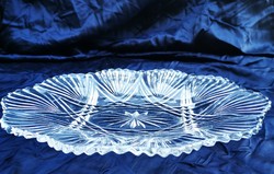 Oval glass bowl with cookies and fruit. A polished, elegant piece