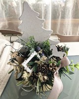 Christmas table decoration in wood with pine tree