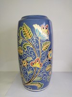 Richly decorated colorful ceramic vase