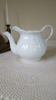 Old, very thick white porcelain teapot, jug